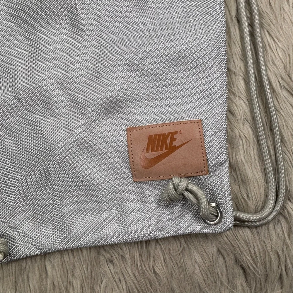 Nike Heritage Metallic Silver Mesh Drawstring Backpack Bag